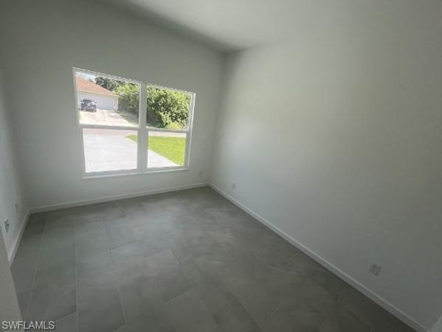 1230 Celtic ST E, Lehigh Acres, FL 33974