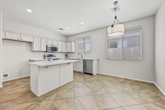 9042 W BLUEFIELD Avenue, Peoria, AZ 85382