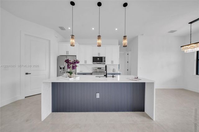 3115 2nd ST SW, Lehigh Acres, FL 33976