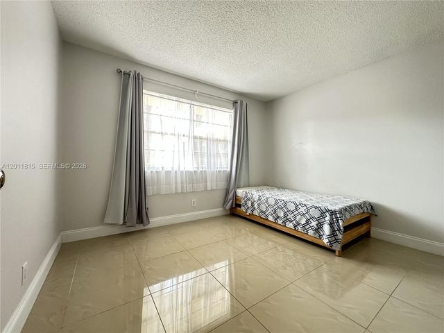 9370 SW 8th St 107, Boca Raton, FL 33428