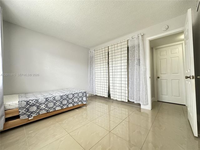 9370 SW 8th St 107, Boca Raton, FL 33428