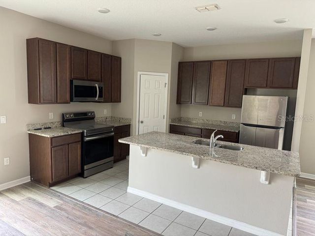 3345 CURLEW AVENUE, Leesburg, FL 34748