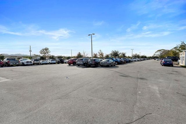 7350 NARCOOSSEE ROAD, Orlando, FL 32822
