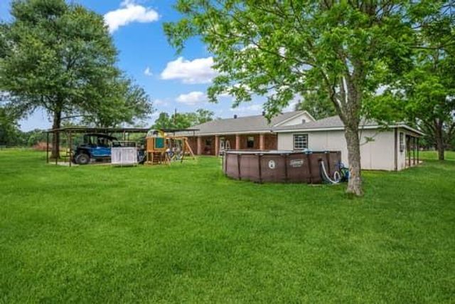199 County Road 2357, Hardin, TX 77575