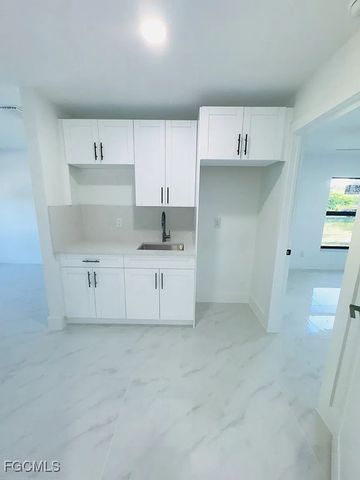 15 Louisiana RD, Lehigh Acres, FL 33936