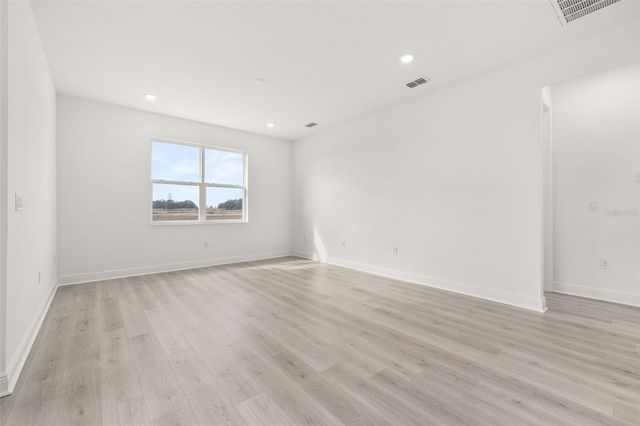 1014 SWAMP CHESTNUT LOOP, Lady Lake, FL 32159