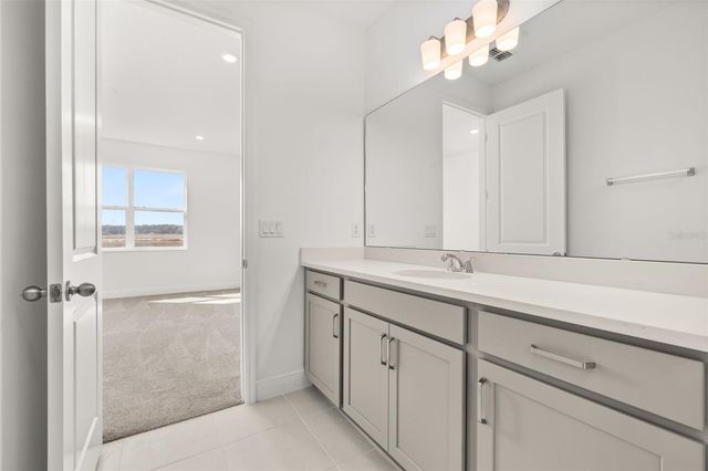 1014 SWAMP CHESTNUT LOOP, Lady Lake, FL 32159