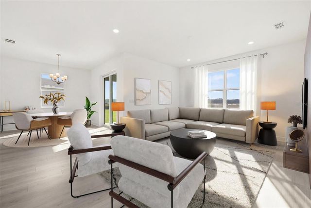 1014 SWAMP CHESTNUT LOOP, Lady Lake, FL 32159