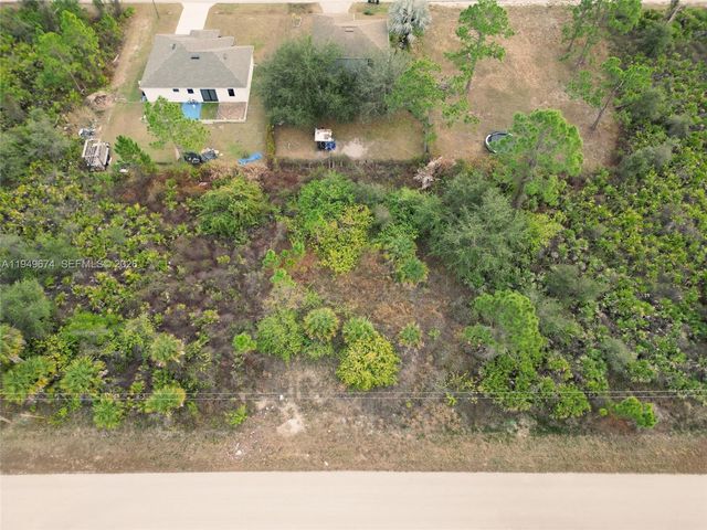 549 BEACH AVE S, Lehigh Acres, FL 33974