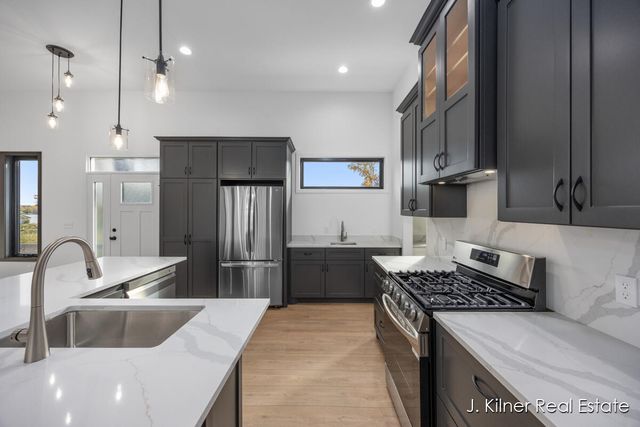 9465 Wabasis Pointe Drive NE, Greenville, MI 48838