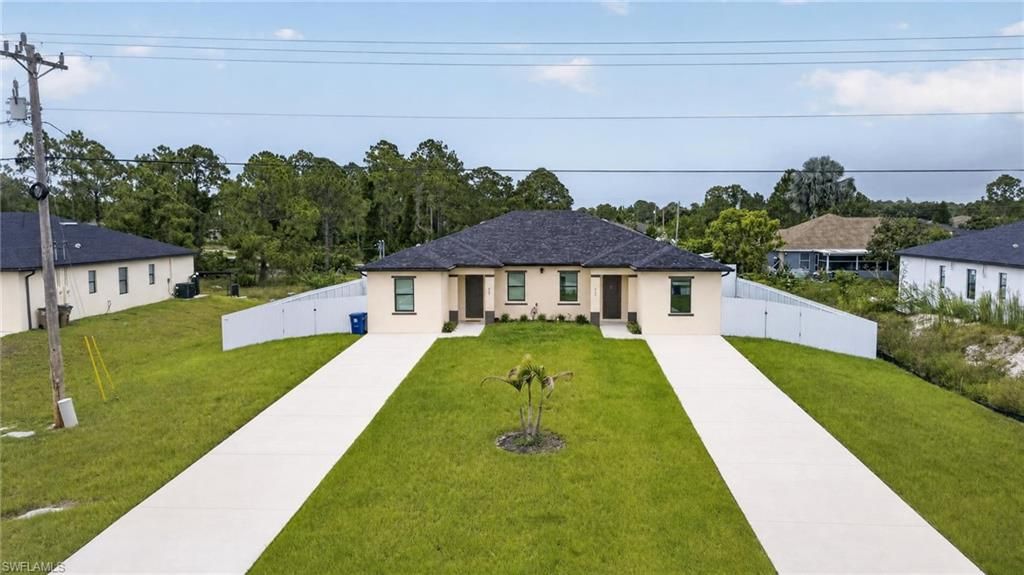 909/911 Homestead RD S, LEHIGH ACRES, FL 33974 — exterior