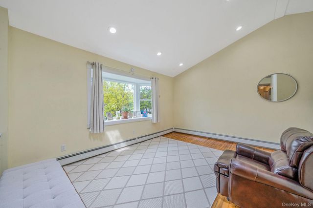 8 Gaymor Lane, Farmingville, NY 11738