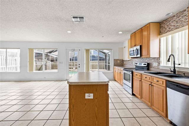 1212 SANDBROOK DRIVE, Orlando, FL 32824
