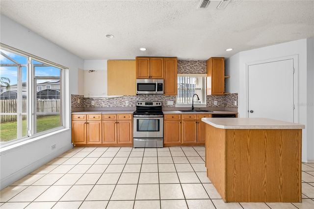 1212 SANDBROOK DRIVE, Orlando, FL 32824