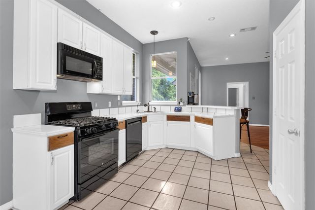 4910 Pleasure Lake Drive, Willis, TX 77318