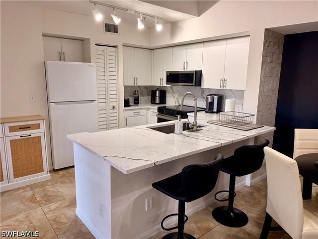 1265 Wildwood Lakes BLVD 303, Naples, FL 34104