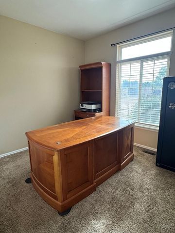 1036 S Los Charros Dr, Pueblo West, CO 81007