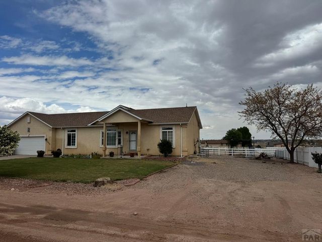 1036 S Los Charros Dr, Pueblo West, CO 81007