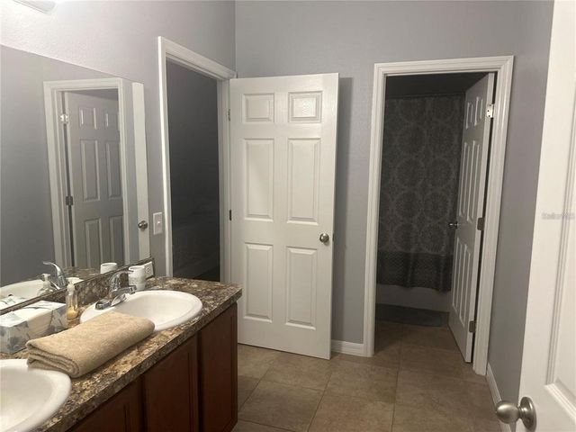 203 HIGHLAND MEADOWS STREET, Davenport, FL 33837