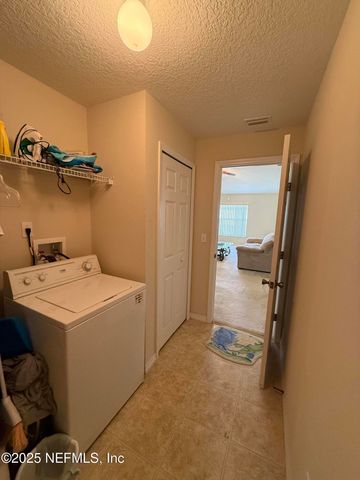 24 SEVILLE ORANGE Path, Palm Coast, FL 32164