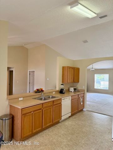 24 SEVILLE ORANGE Path, Palm Coast, FL 32164