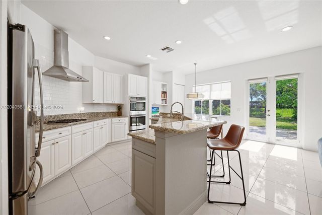 8530 Miralago Way, Parkland, FL 33076
