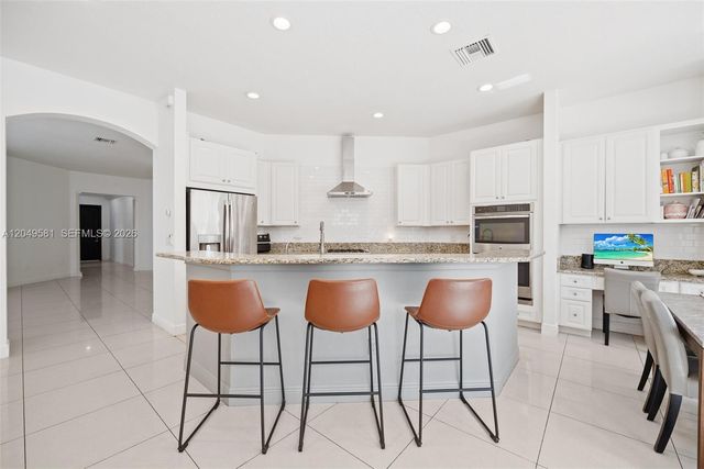 8530 Miralago Way, Parkland, FL 33076