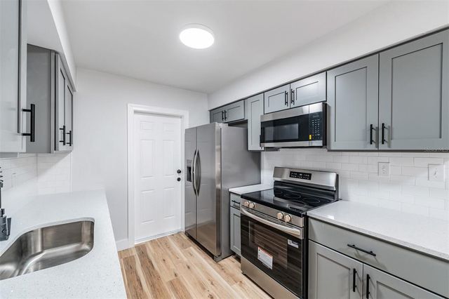 1406 E HOLLAND AVENUE, Tampa, FL 33612