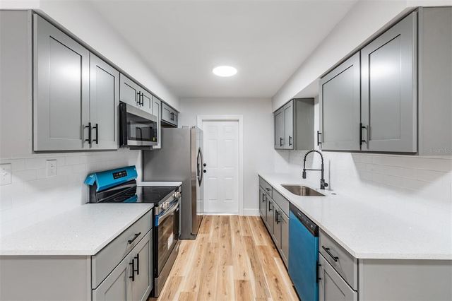 1406 E HOLLAND AVENUE, Tampa, FL 33612