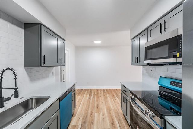 1406 E HOLLAND AVENUE, Tampa, FL 33612
