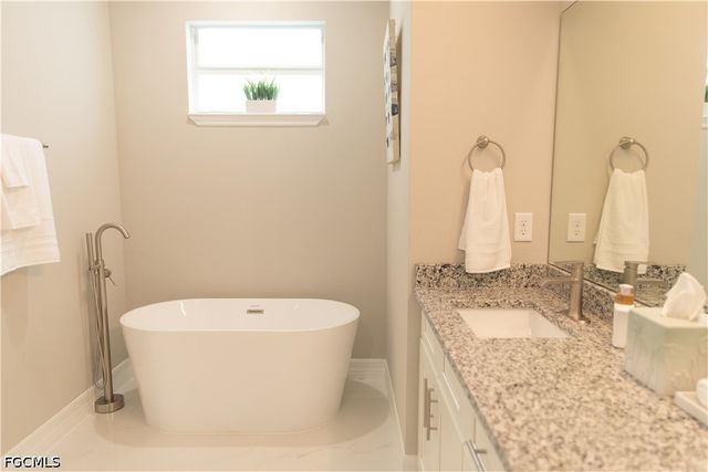 1226 Chrisholm ST, Lehigh Acres, FL 33974