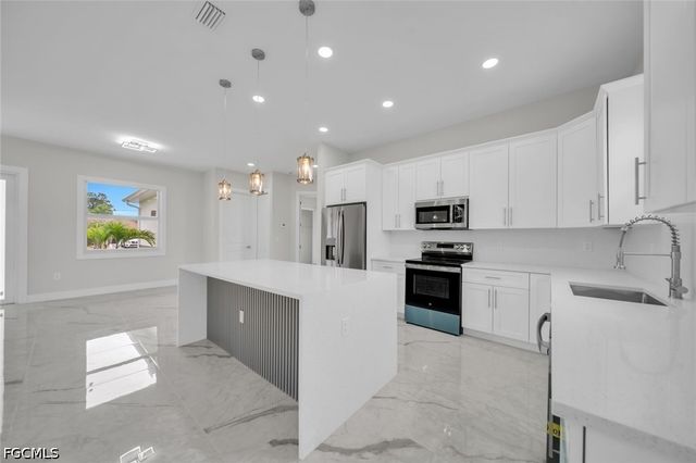 2715 10th ST W, Lehigh Acres, FL 33971