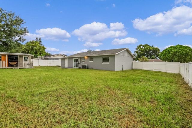 7744 LIVERPOOL BOULEVARD, Orlando, FL 32807