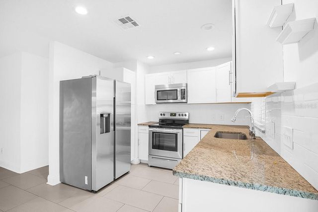 7744 LIVERPOOL BOULEVARD, Orlando, FL 32807