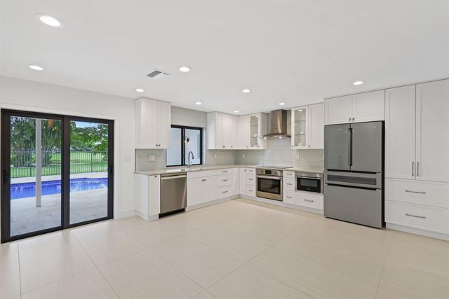 20195 Back 9 Drive, Boca Raton, FL 33498