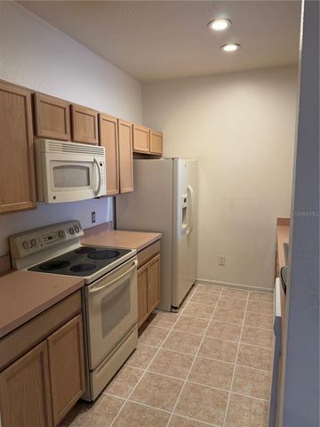 13572 TURTLE MARSH LOOP 234, Orlando, FL 32837