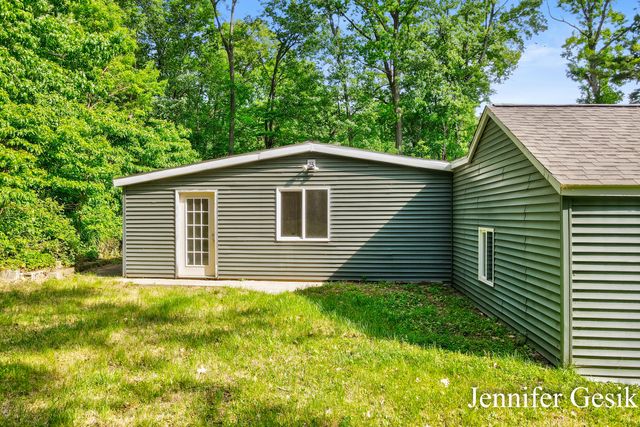 8735 Brower Lake Drive NE, Rockford, MI 49341