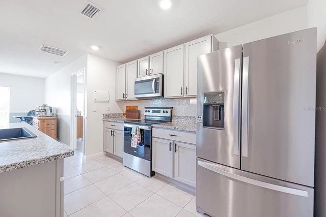 8574 TRIUMPH CIRCLE, Wildwood, FL 34785