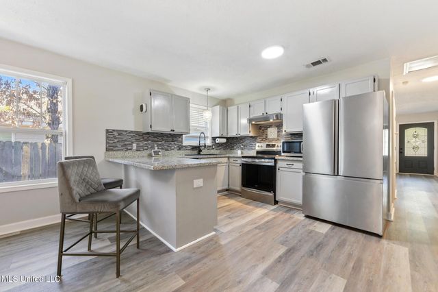 10740 Lilinoe Way, Diamondhead, MS 39525