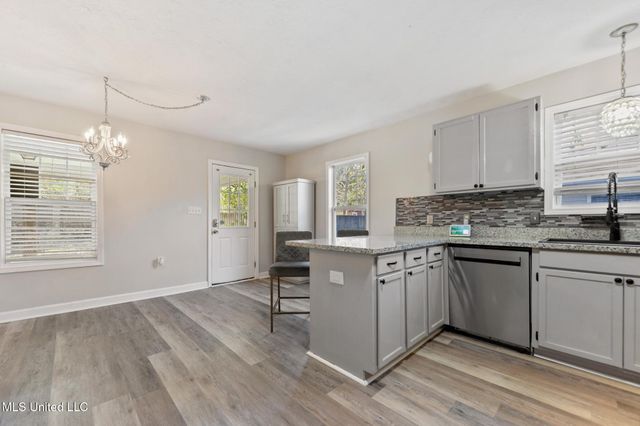 10740 Lilinoe Way, Diamondhead, MS 39525