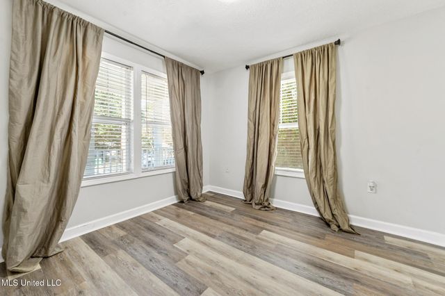 10740 Lilinoe Way, Diamondhead, MS 39525