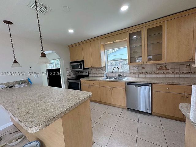 3232 Village Green Dr, Miami, FL 33175