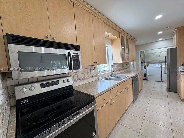 3232 Village Green Dr, Miami, FL 33175