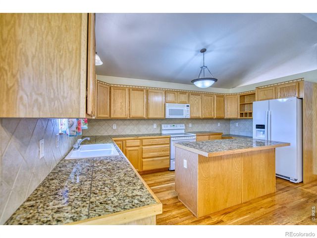 1384 Saginaw Pointe Drive, Windsor, CO 80550
