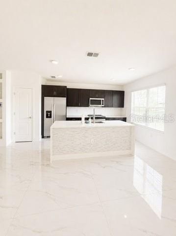 1562 CARBONDALE ROW, Kissimmee, FL 34744