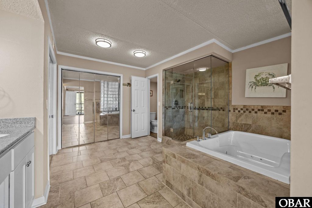 Image 17 of property listing at 8111 S Old Oregon Inlet Rd Unit A-102, Nags Head, NC 27959