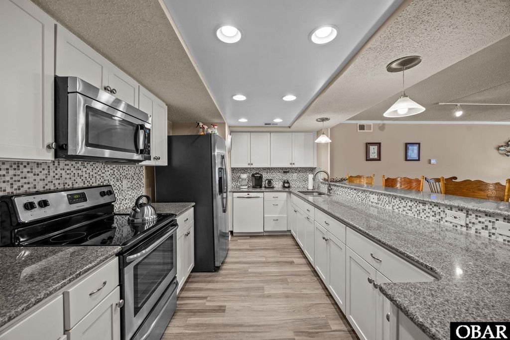 Image 6 of property listing at 8111 S Old Oregon Inlet Rd Unit A-102, Nags Head, NC 27959