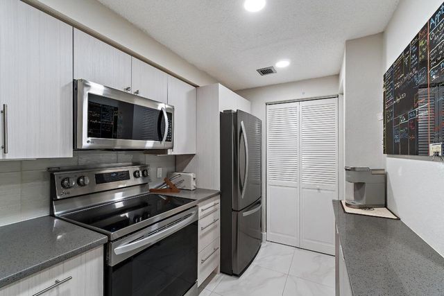 3021 Alcazar Place 103, Palm Beach Gardens, FL 33410