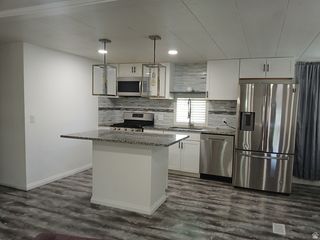 1209 W MEADOW STREAM RD #67, West Valley City, UT 84119