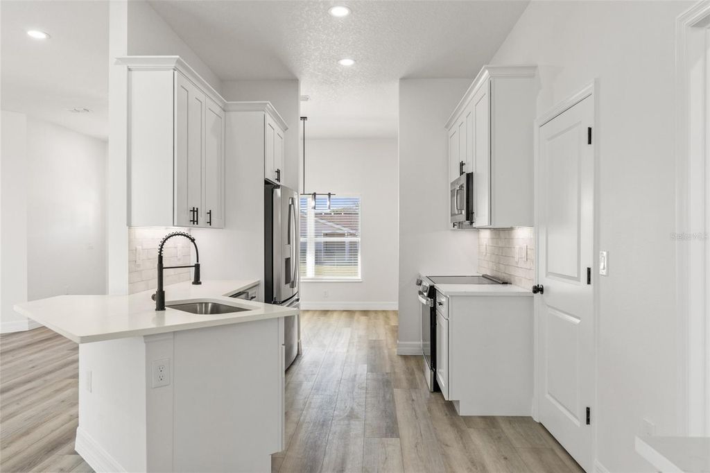 Image 10 of property listing at 12406 PARCHMENT DRIVE, Hudson, FL 34667